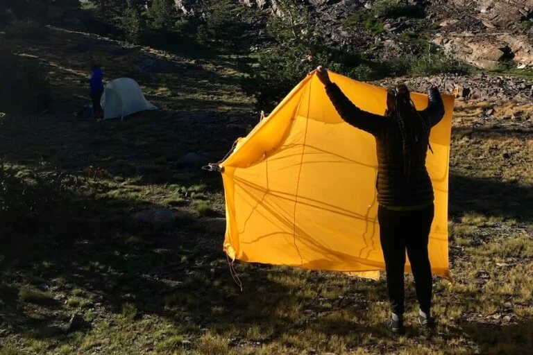 How should you pack a wet tent?